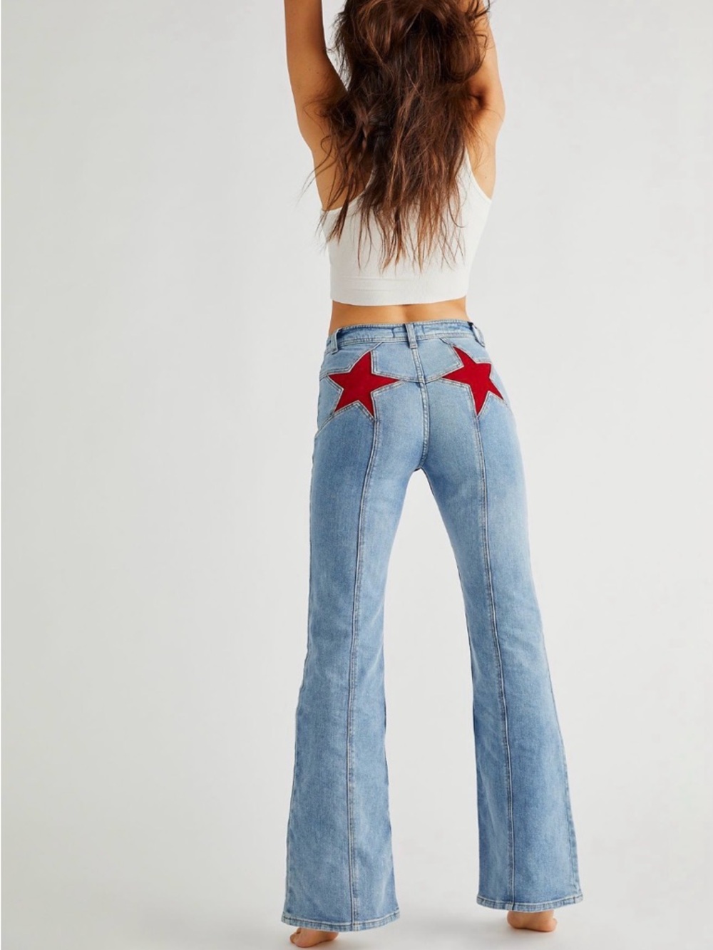 We The Free Light Wash Wide Leg Jeans with Red Star Back Pockets